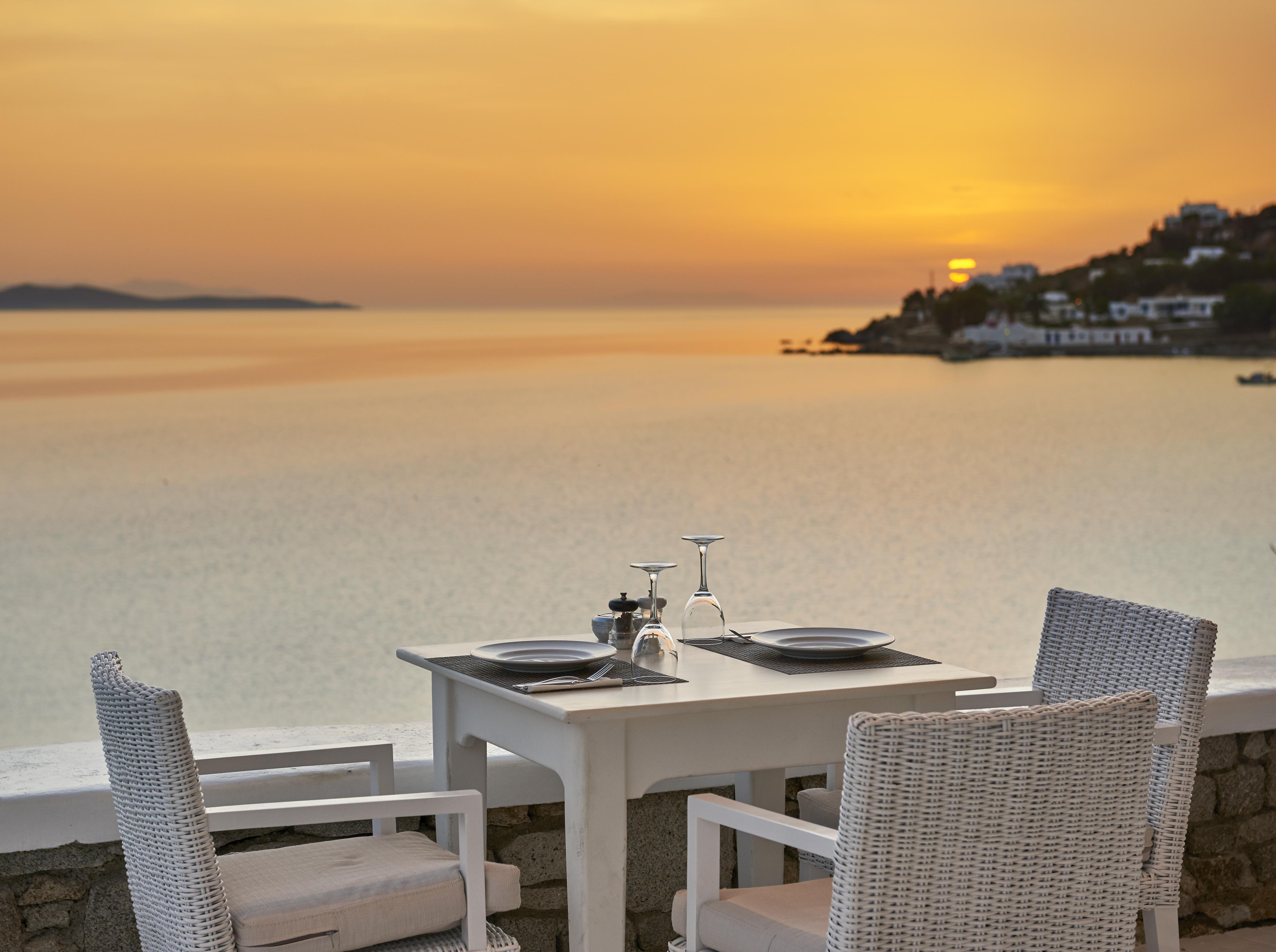 Saint John Hotel Villas & Spa Agios Ioannis Diakoftis Eksteriør billede Sunset at the restaurant