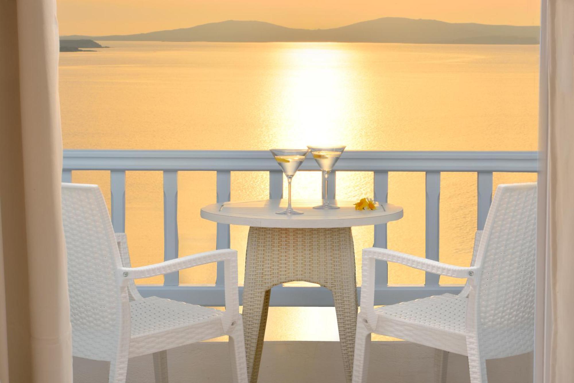 Saint John Hotel Villas & Spa Agios Ioannis Diakoftis Værelse billede Sunset at the hotel