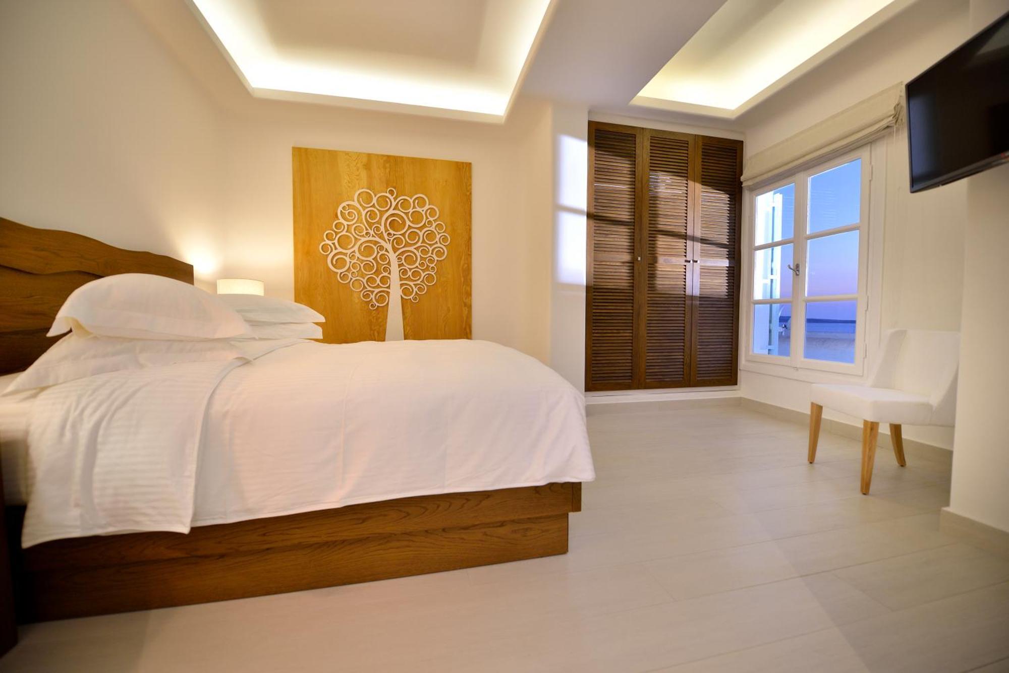 Saint John Hotel Villas & Spa Agios Ioannis Diakoftis Eksteriør billede A bedroom at the hotel