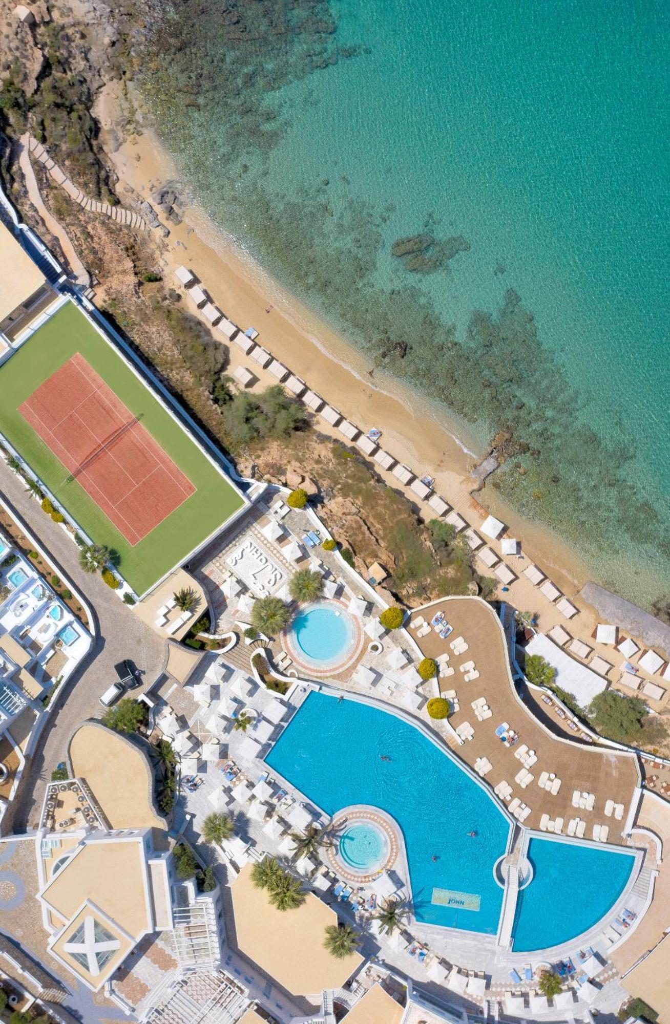 Saint John Hotel Villas & Spa Agios Ioannis Diakoftis Eksteriør billede Aerial view of the tennis court